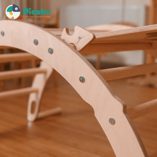 Wooden children's climbing toy from Picabu, showcasing quality craftsmanship and safe play design on a wooden floor background.